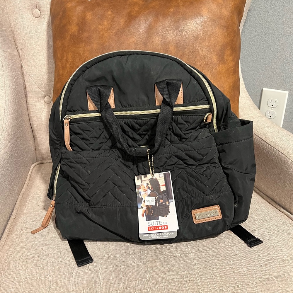 Skip hop diaper bag backpack in black with gold accents
